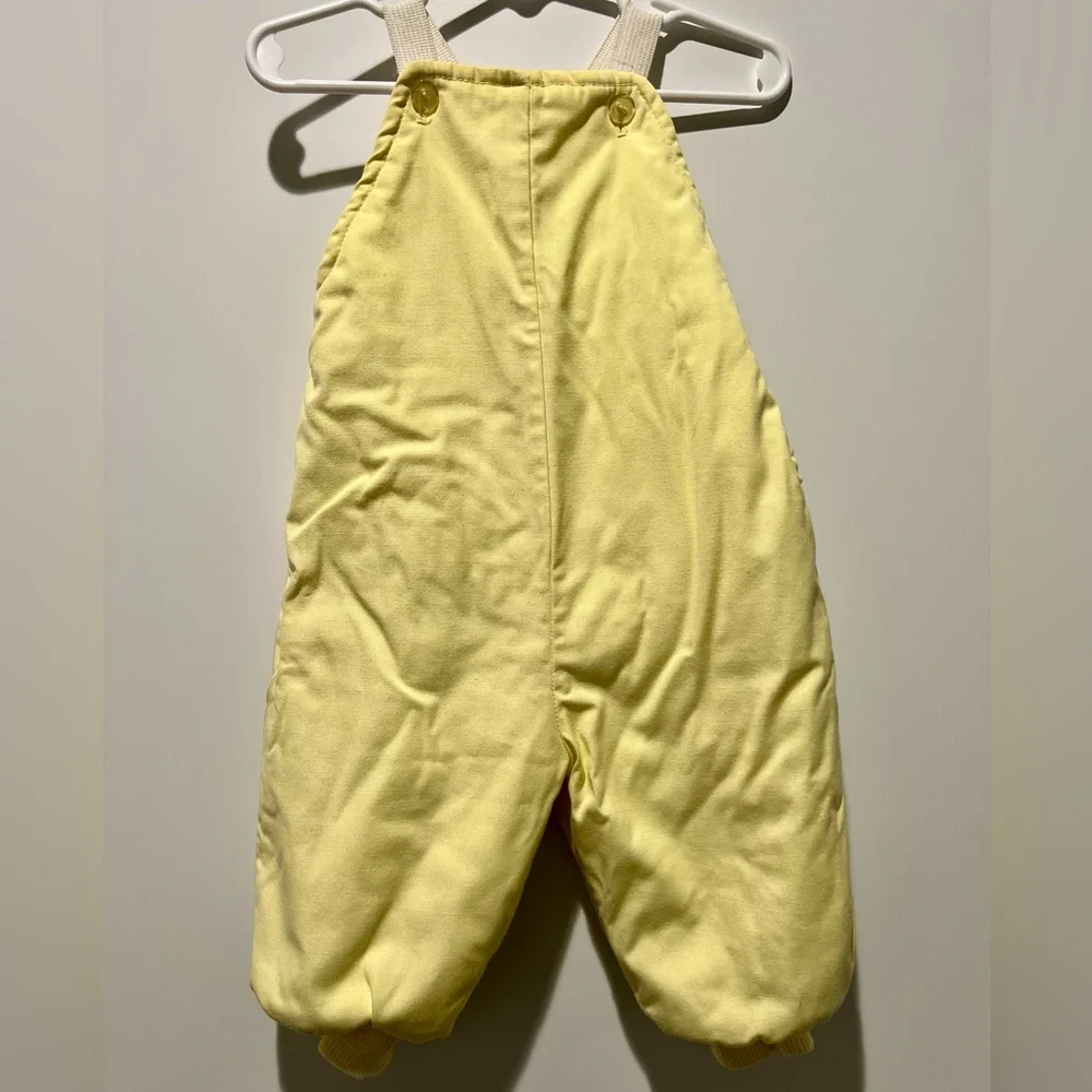 Vintage yellow two-piece baby snowsuit by Playland featuring embroidered giraffe